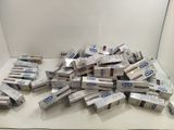 a pile of toothpaste sitting on top of a table