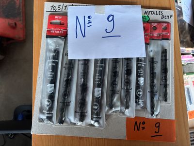a lot of pens that are on a table