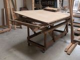 several pieces of wood sit on top of a table in a room