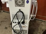 une machine posée sur le sol du garage