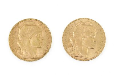 deux souverains d'or, dont l'un représente la tête d'une femme et l'autre celle d'un homme