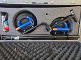 a case that has a pair of air tools inside of it