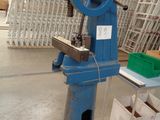 a machine that is sitting on the floor in a warehouse