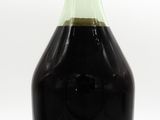 a bottle of liquor that is sitting on a table