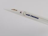 a model of an air france plane flying in the sky