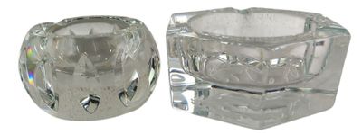 a glass candle holder and a glass candle holder on a white background