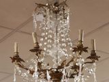 a chandelier hanging from the ceiling in a room