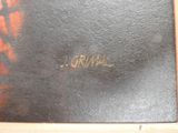 an image of a book with writing on it sitting on top of a table