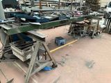 a picture of a workbench in a factory with tools on it