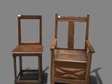 two wooden chairs sitting next to each other on a gray surface