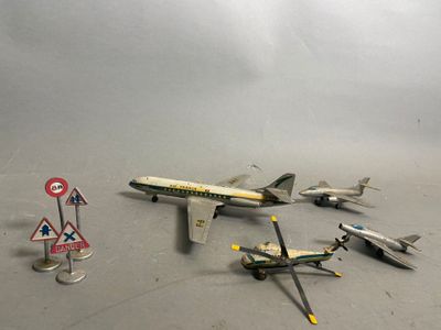 a lot of toy airplanes that are sitting on the floor