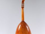 a large wooden instrument hanging from the ceiling