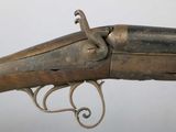 an old gun that has been used as a weapon for a war