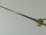 a sword that is laying on a table