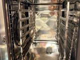 a large oven with a lot of food inside of it