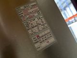 a picture of a metal box with a sticker on it