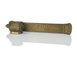 an image of a metal object with a scroll on it