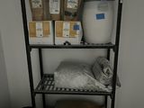 a shelf that has some bags of food on top of it