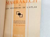 a book that is open on a white table