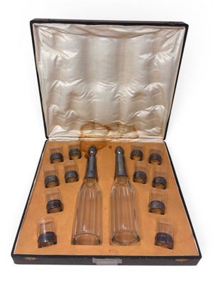 a case that has a set of glass bottles inside of it