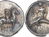 an image of a silver coin with a horse and rider on it