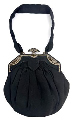 an image of a black purse on a white background