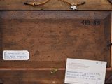 a picture of a wooden picture frame with a note attached to it