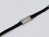 an image of a wrist watch on a white surface