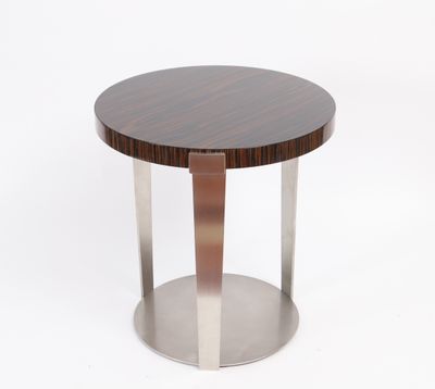 a close up of a table with a wooden top and metal legs