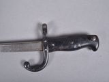 a small knife that is laying on a table