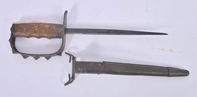 a knife and a knife holder on a white surface