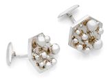 two pairs of silver and pearl cufflinks on a white background
