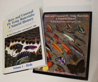 two books that are sitting on a table