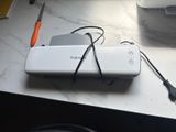 a white device that is sitting on a table