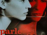 a movie poster with a woman and a man staring at each other
