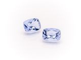 a pair of blue sapphires on a white background