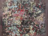 a painting of a red and black abstract painting on a brown surface
