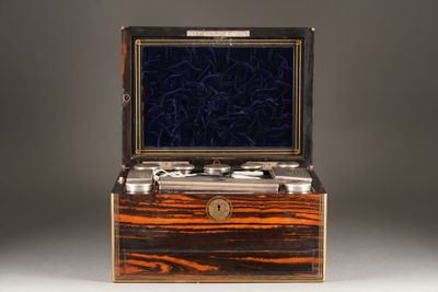 an image of a wooden box with silverware inside of it