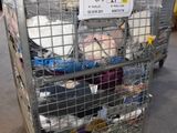 a cart with many items in it in a warehouse