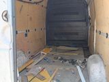 a van that has been vandalized and is in the process of being repaired