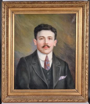 painting of a man in a suit and tie in a gold frame