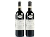 two bottles of wine sitting next to each other on a white surface