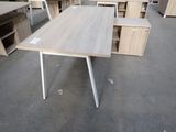 many desks and cabinets in a large room