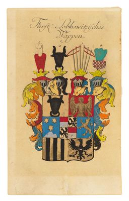 un vieux livre sur lequel figure un blason