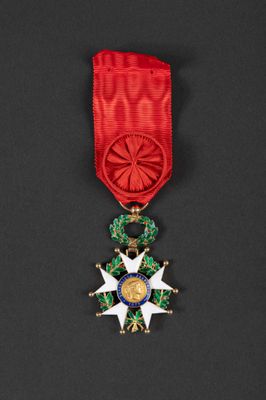 a close up of a medal on a black surface
