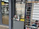 a store front with a lot of items on display