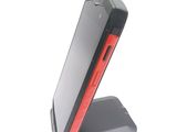 a cell phone that is sitting on a stand