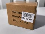 a brown box with a barcode on it sitting on a table
