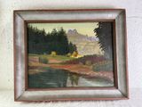 tableau à l'huile encadré représentant un paysage avec une rivière et des arbres