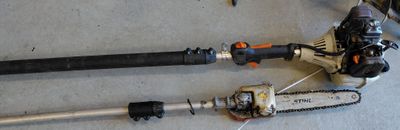 two chainsaws that are laying on the floor